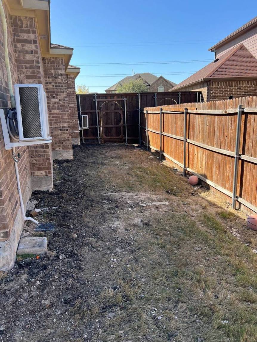 Mini-split units mounted on the finished brick wall
