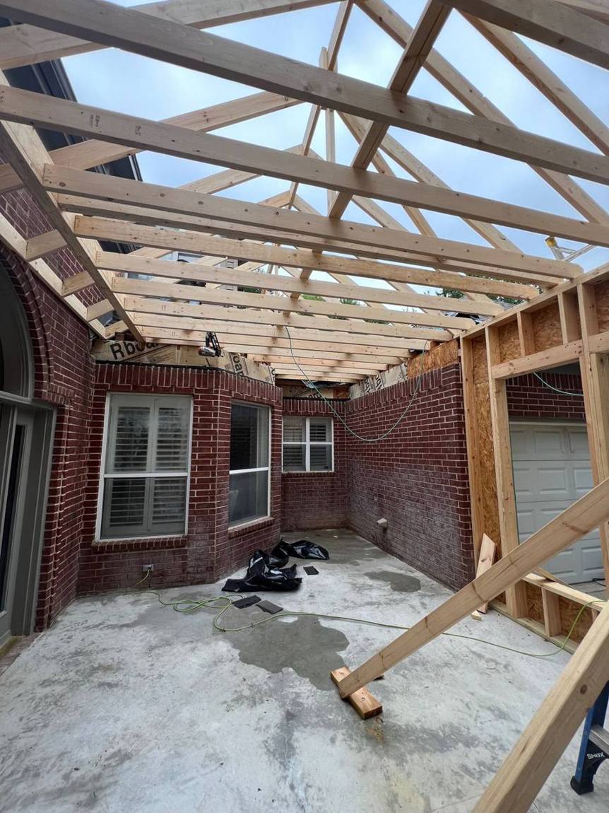 New roof rafters tied into the existing house