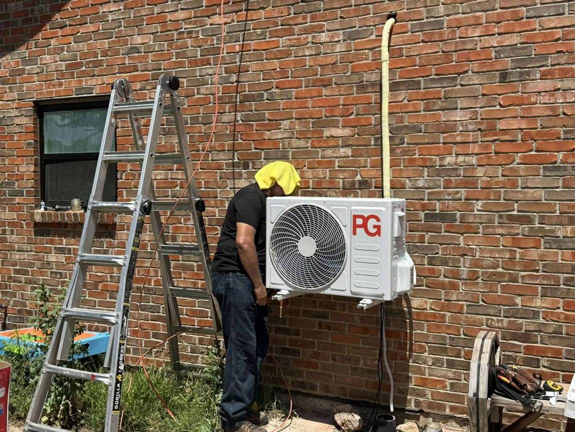 Mini-split outdoor unit mounted on the wall